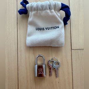Authentic New Louis Vuitton Lock and Key (New in Box) Silver